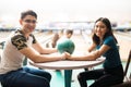 Teen Couple With Bowling Ball Holding Hands Over Table Royalty Free Stock Photo