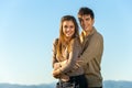 Teen couple embracing outdoors. Royalty Free Stock Photo