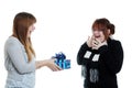 Teen female giving her sister a present