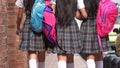 Teen Female Students With Backpacks