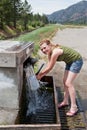 Teen Getting Spring Water