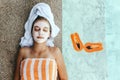 Teen girl applying organic fruit facial mask Royalty Free Stock Photo