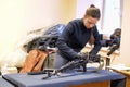 Teen girl assemble and disassemble Kalashnikov rifle competitions Royalty Free Stock Photo