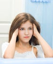 Teen girl in bathroom Royalty Free Stock Photo