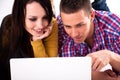 Teen girl and boy with white laptop Royalty Free Stock Photo