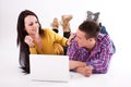 Teen girl and boy with white laptop Royalty Free Stock Photo