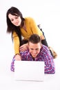 Teen girl and boy with white laptop Royalty Free Stock Photo