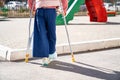 teen girl with a broken leg on crutches in the playground. Royalty Free Stock Photo