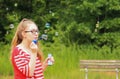 Teen girl-bubbles all around Royalty Free Stock Photo