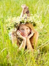 Teen girl in camomiles chaplet Royalty Free Stock Photo