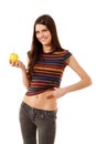 Teen girl cheerful slim with apple Royalty Free Stock Photo