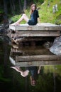 Teen girl on a dock Royalty Free Stock Photo