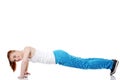 Teen girl doing exercises on the floor. Royalty Free Stock Photo