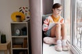 Teen Girl With Down Syndrome By Window Royalty Free Stock Photo