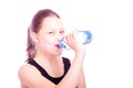 Teen girl drinking water from bottle Royalty Free Stock Photo