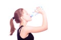 Teen girl drinking water from bottle Royalty Free Stock Photo