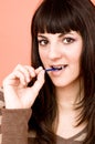 Teen Girl Eating A Lollipop Royalty Free Stock Photo