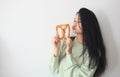 Teen girl eating a pretzel Royalty Free Stock Photo