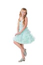 Teen girl in fancy gown dancing isolated Royalty Free Stock Photo