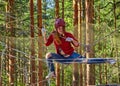 Teen Girl in a Forest Rope Park Challenge