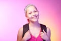 Teen girl goes to school with a backpack on her back Royalty Free Stock Photo