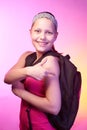 Teen girl goes to school with a backpack on her back Royalty Free Stock Photo