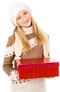 Teen girl in a hat holding a gift Royalty Free Stock Photo