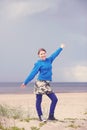 Teen girl having fun on the beach Royalty Free Stock Photo