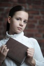 Teen girl holding a diary Royalty Free Stock Photo