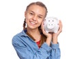 Teen girl holding piggy bank Royalty Free Stock Photo