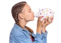 Teen girl holding piggy bank Royalty Free Stock Photo