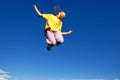 Teen girl jumping in air Royalty Free Stock Photo