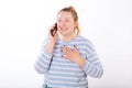 Teen girl laughing and talking on the phone Royalty Free Stock Photo