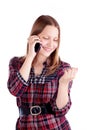 Teen girl laughing and talking on the phone Royalty Free Stock Photo