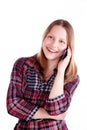 Teen girl laughing and talking on the phone Royalty Free Stock Photo