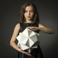 Teen girl with paper in hand polygon figure.