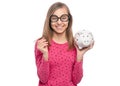 Teen girl with piggy bank Royalty Free Stock Photo