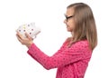 Teen girl with piggy bank Royalty Free Stock Photo