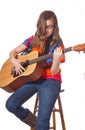 Teen Girl playing guitar Royalty Free Stock Photo