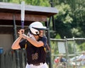 Teen girl playing softball