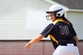 Teen girl playing softball