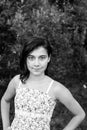 Teen girl portrait in the park outdoors. Black and white photo. Royalty Free Stock Photo