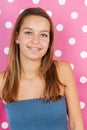 Teen girl portrait on pink Royalty Free Stock Photo