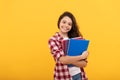 teen girl ready to study. happy childhood. cheerful kid going to do homework with books. Royalty Free Stock Photo