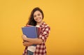 teen girl ready to study. happy childhood. cheerful kid going to do homework with books. Royalty Free Stock Photo