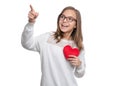 Teen girl with red heart Royalty Free Stock Photo