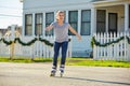 Teen girl rolling skate in the street Royalty Free Stock Photo