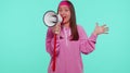 Teen girl scream shout in megaphone loudspeaker announces discounts sale announcing advertisement Royalty Free Stock Photo