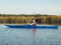 Teen girl sea kayaking
