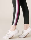 Teen girl with shoes and leggings Royalty Free Stock Photo